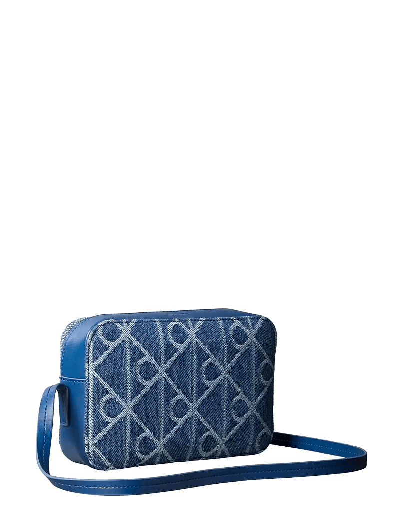 Calvin Klein - EMBLEM AOP DENIM CAMERA BAG - crossbody bags - denim jqd medium wash - 1