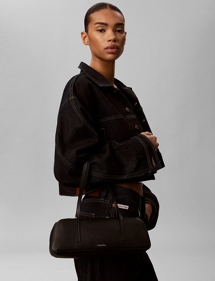 Calvin Klein - FOIL LOGO BAULETTO - shoulder bags - black toasted coconut - 0