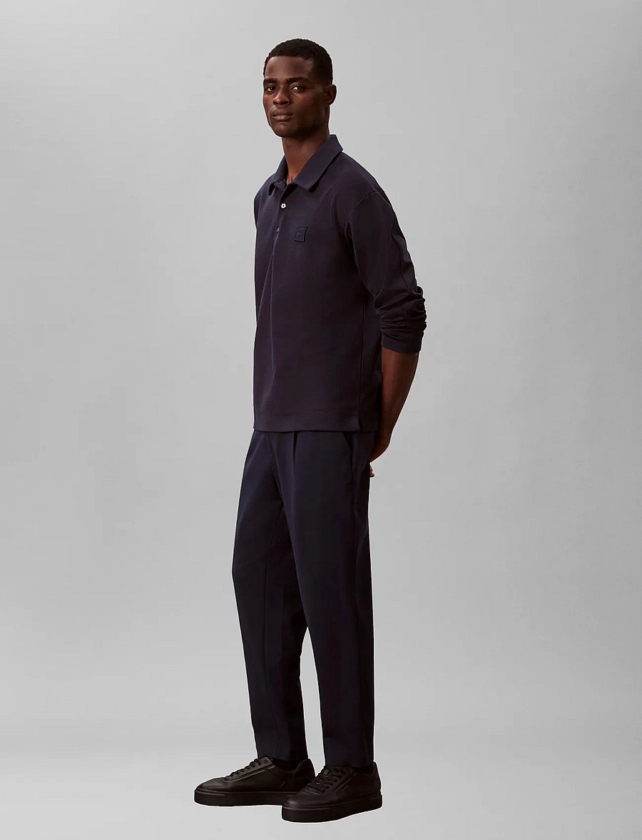 Calvin Klein - SLIM TAPERED KNIT PLEATED PANT - kostiuminės kelnės - dark sapphire - 4
