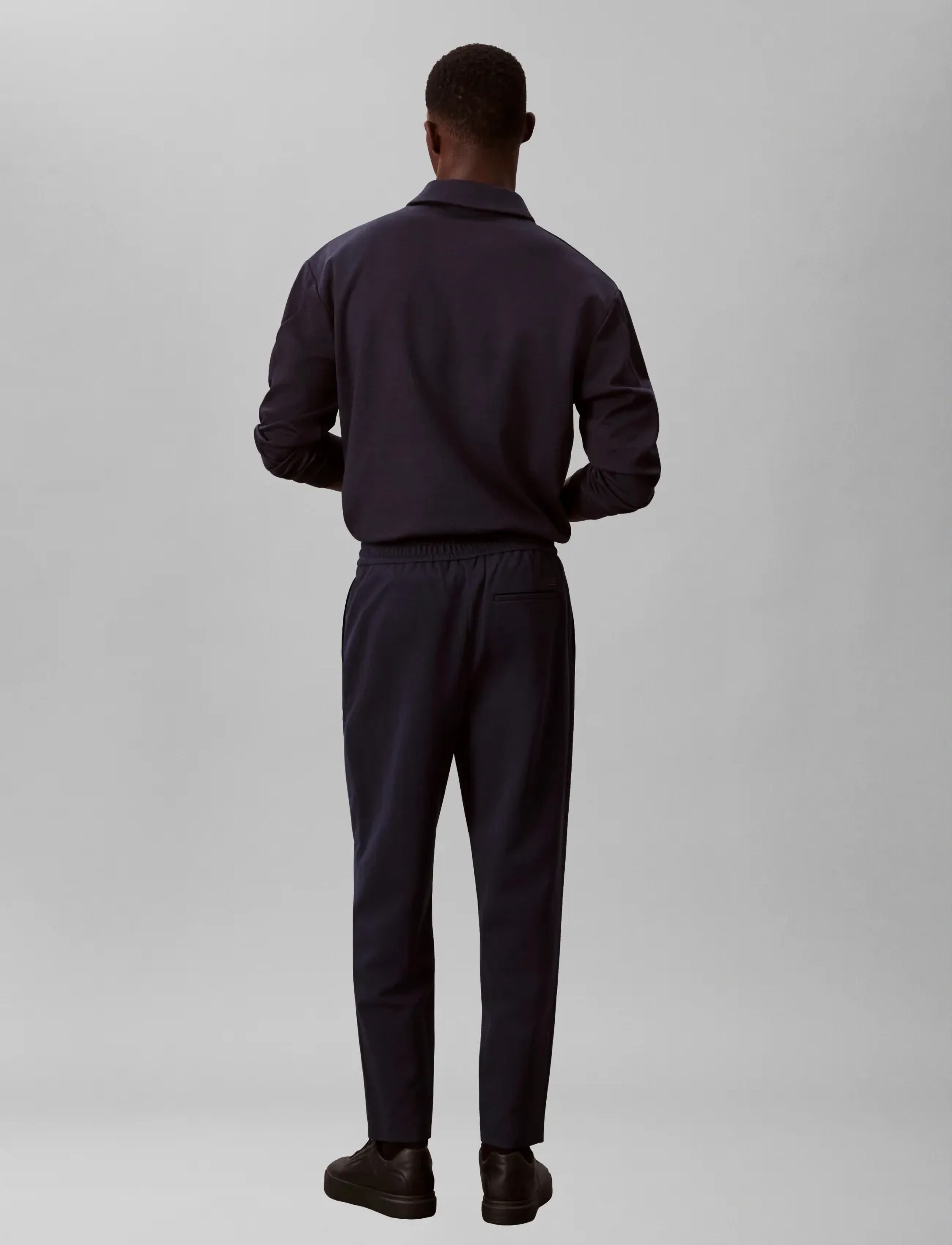 Calvin Klein - SLIM TAPERED KNIT PLEATED PANT - Ülikonnapüksid - dark sapphire - 5