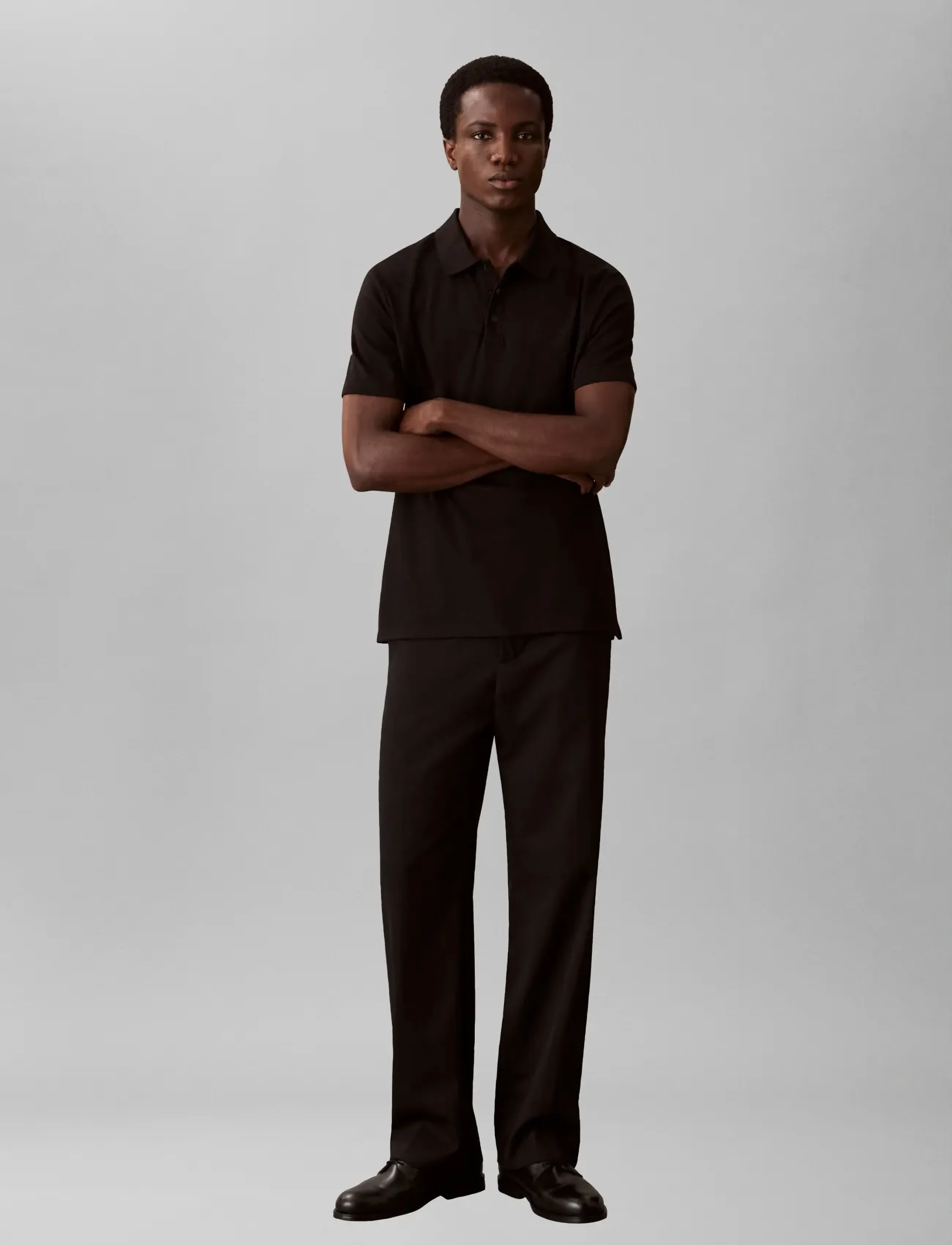 Calvin Klein SS TECH INTERLOCK POLO - Nyheter - BLACK / black
