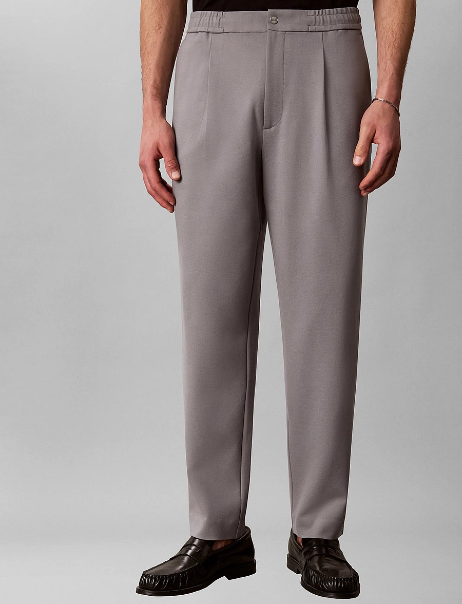 Calvin Klein - TAPERED TECH KNIT PLEATED PANT - casual byxor - convoy - 0