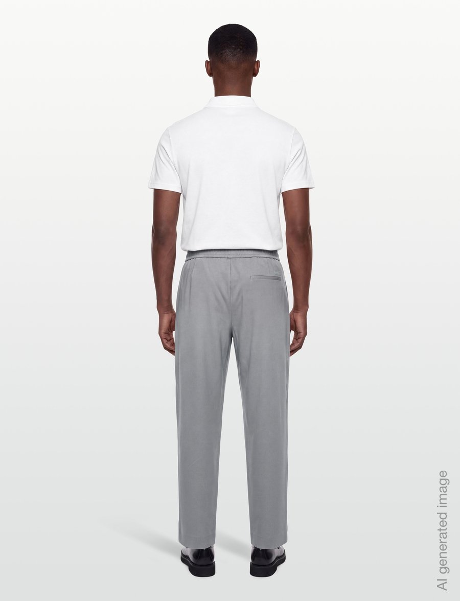 Calvin Klein - TAPERED TECH KNIT PLEATED PANT - vabaajapüksid - convoy - 4