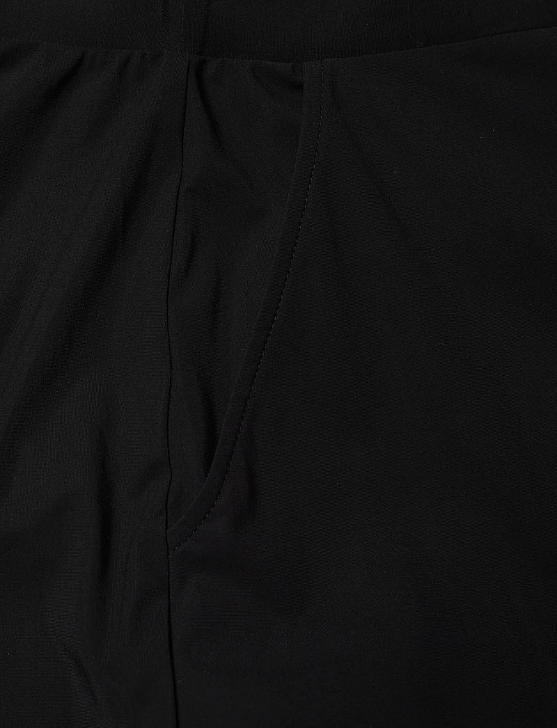 Casall - Weekend Jumpsuit Racerback - kombinezony i body - black - 3