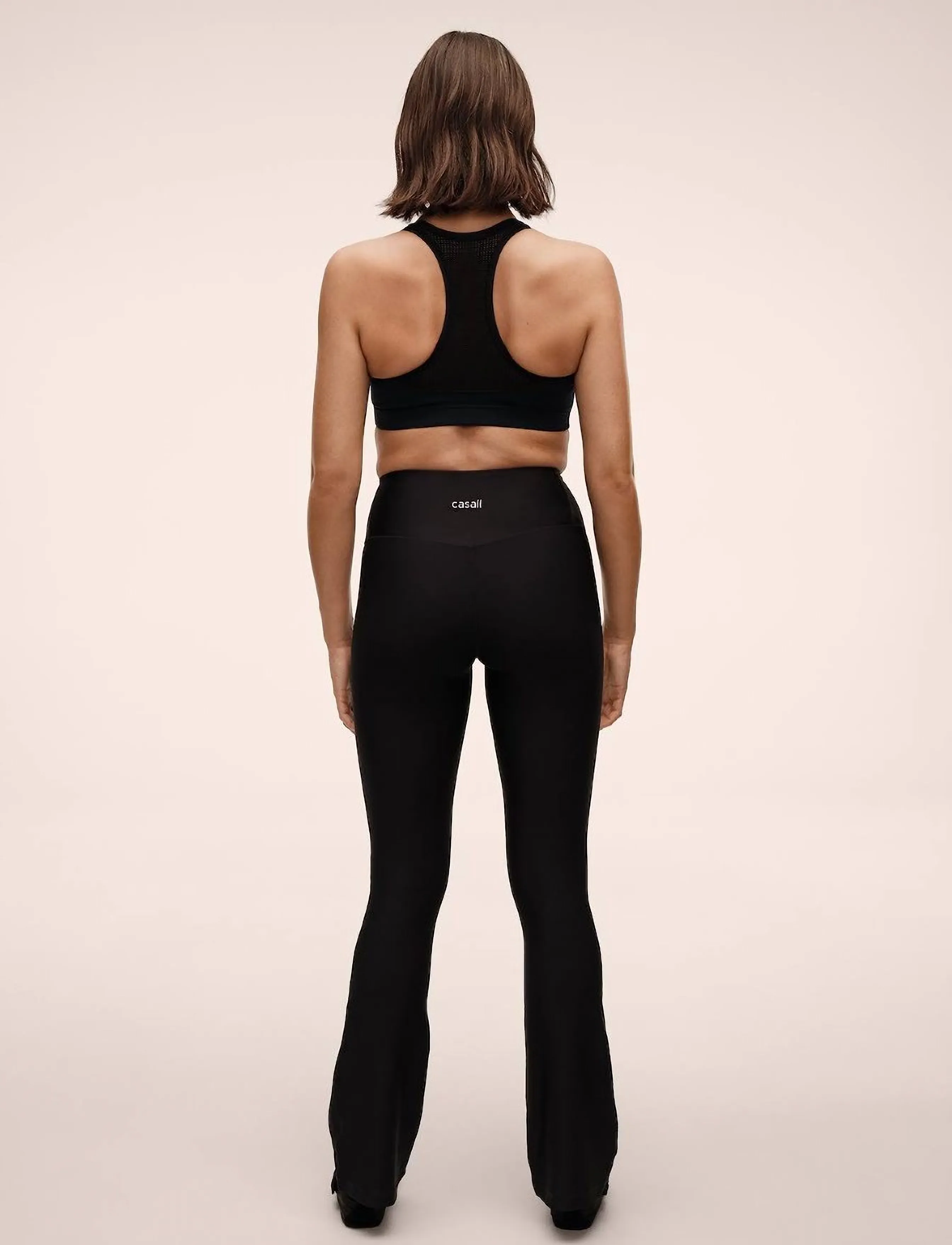 Casall - Flare High Waist Pant - volle länge - black - 0
