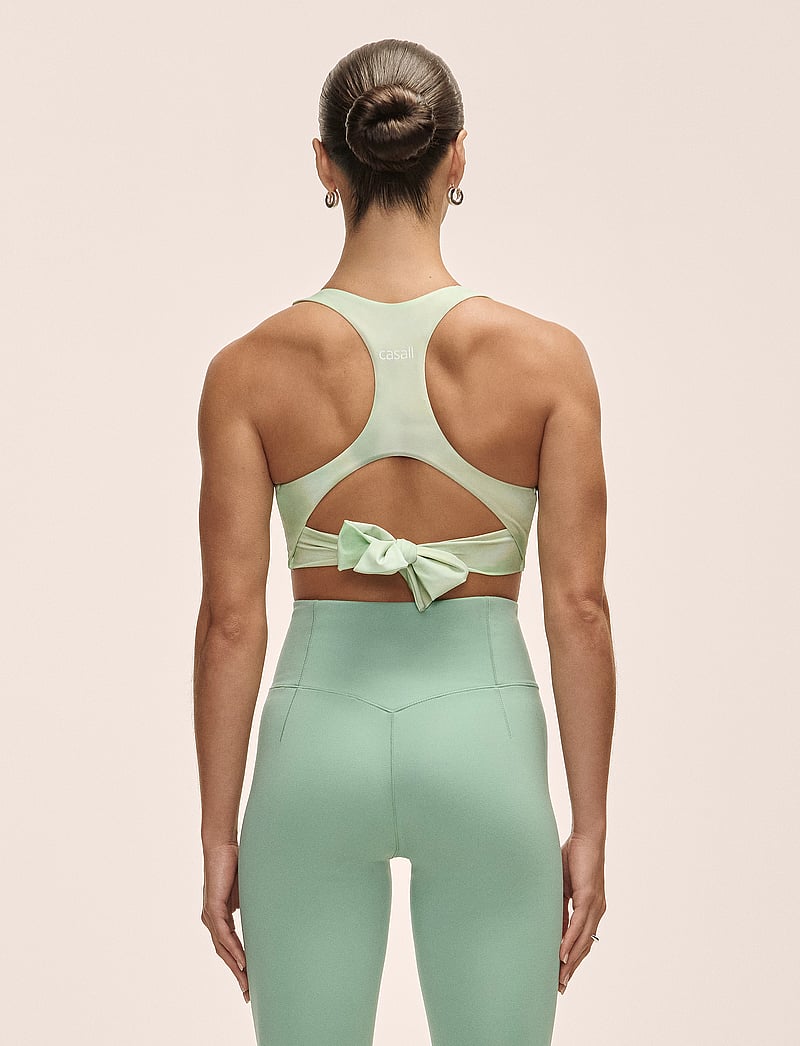 Casall - Tie Back Sports Top - crop-tops - illusion green - 3