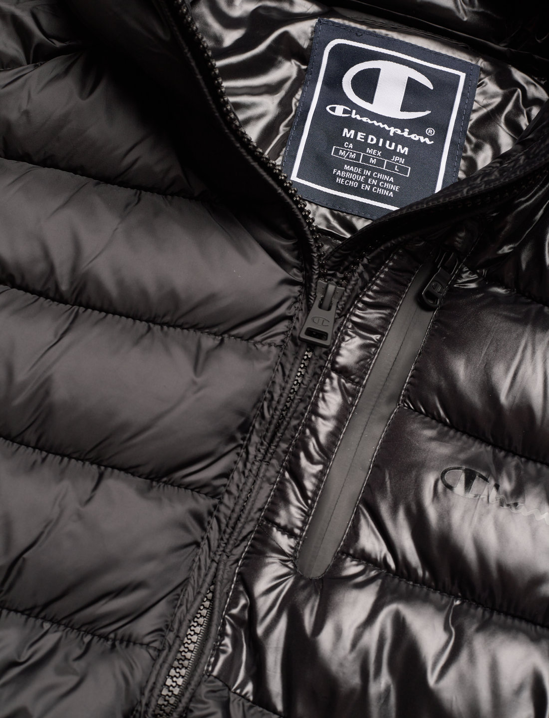 Champion powertrain puffer jacket sales