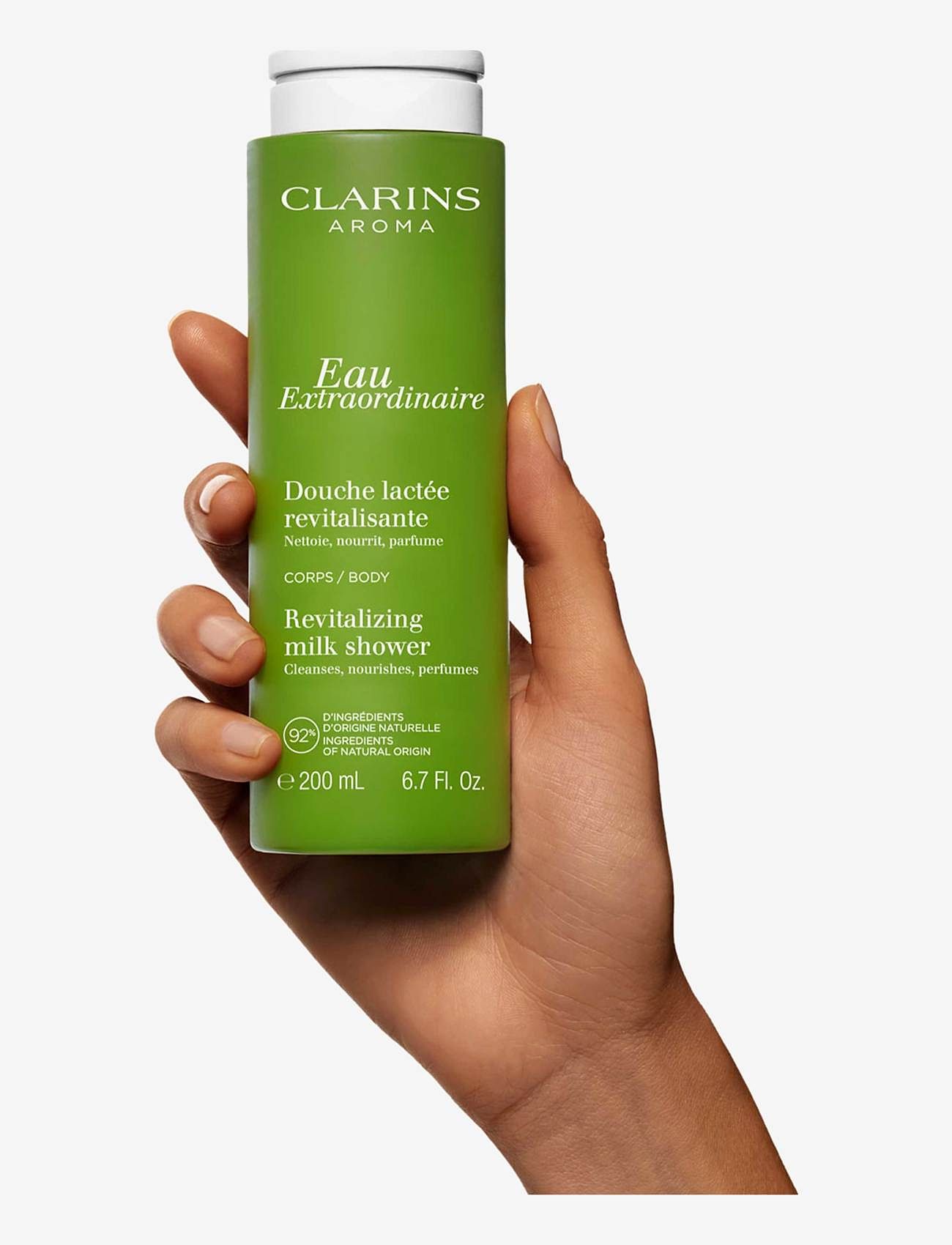 Clarins - Eau Extraordinaire Shower milk 200 ml - duschgel & duscholjor  - no colour - 5
