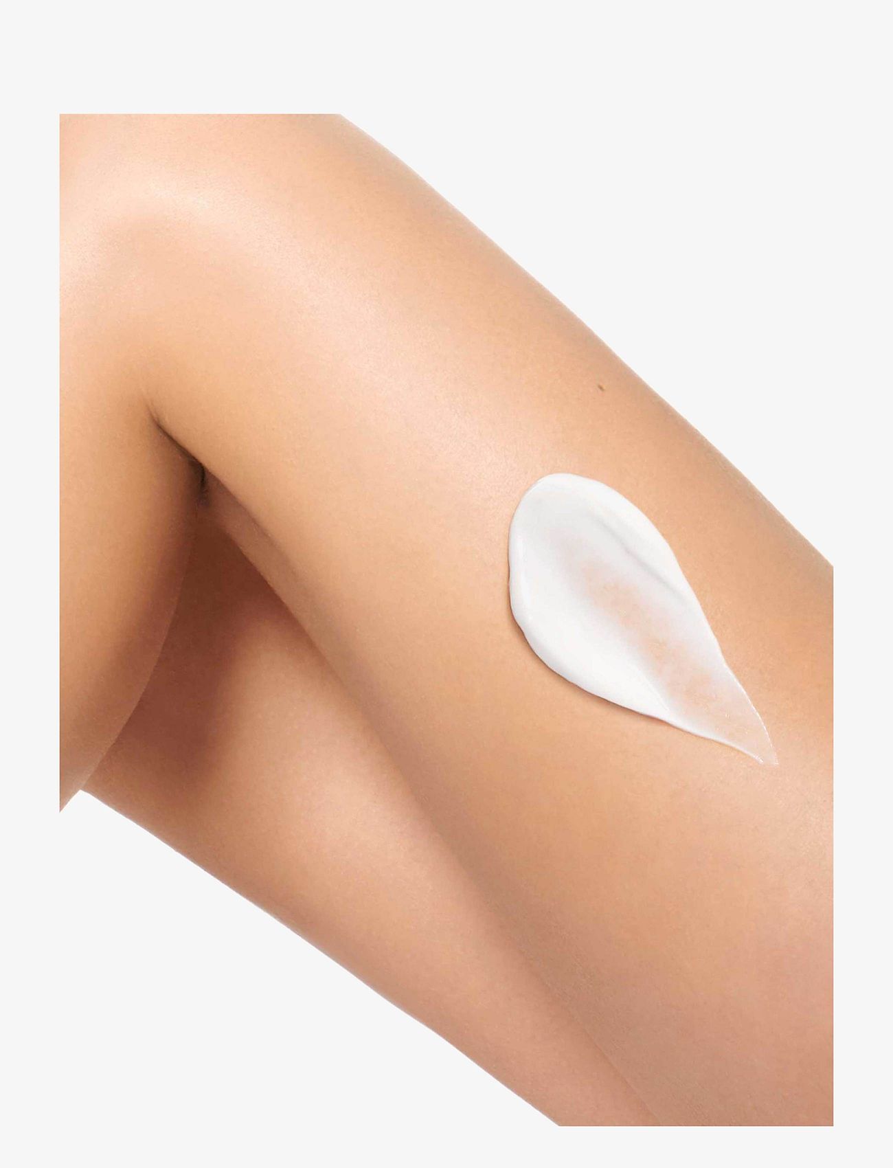 Clarins - Eau Dynamisante Energizing melting body lotion - lotion & creme - no colour - 3