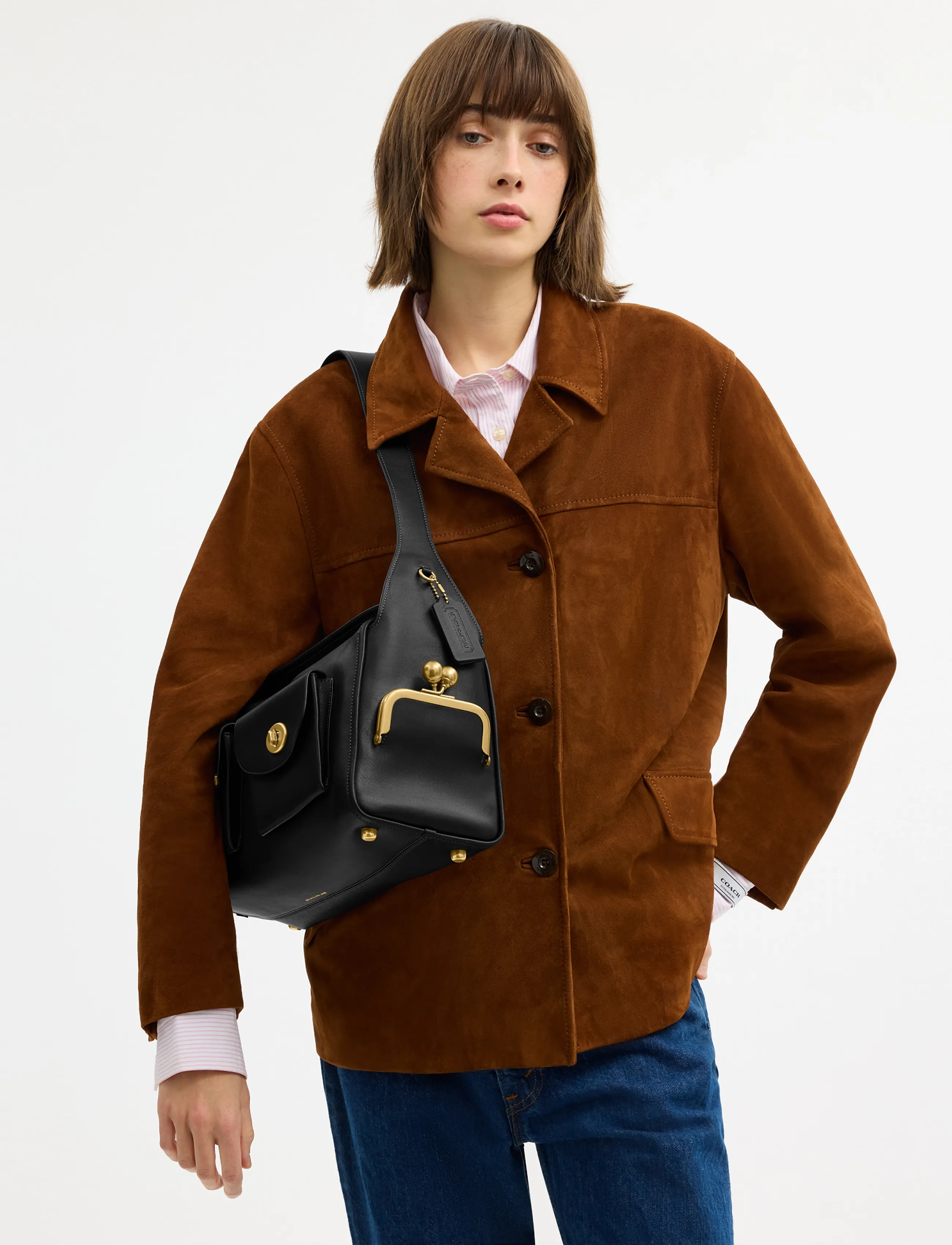 The Coach Originals Natural Grain Leather Turnlock Haversack Bag