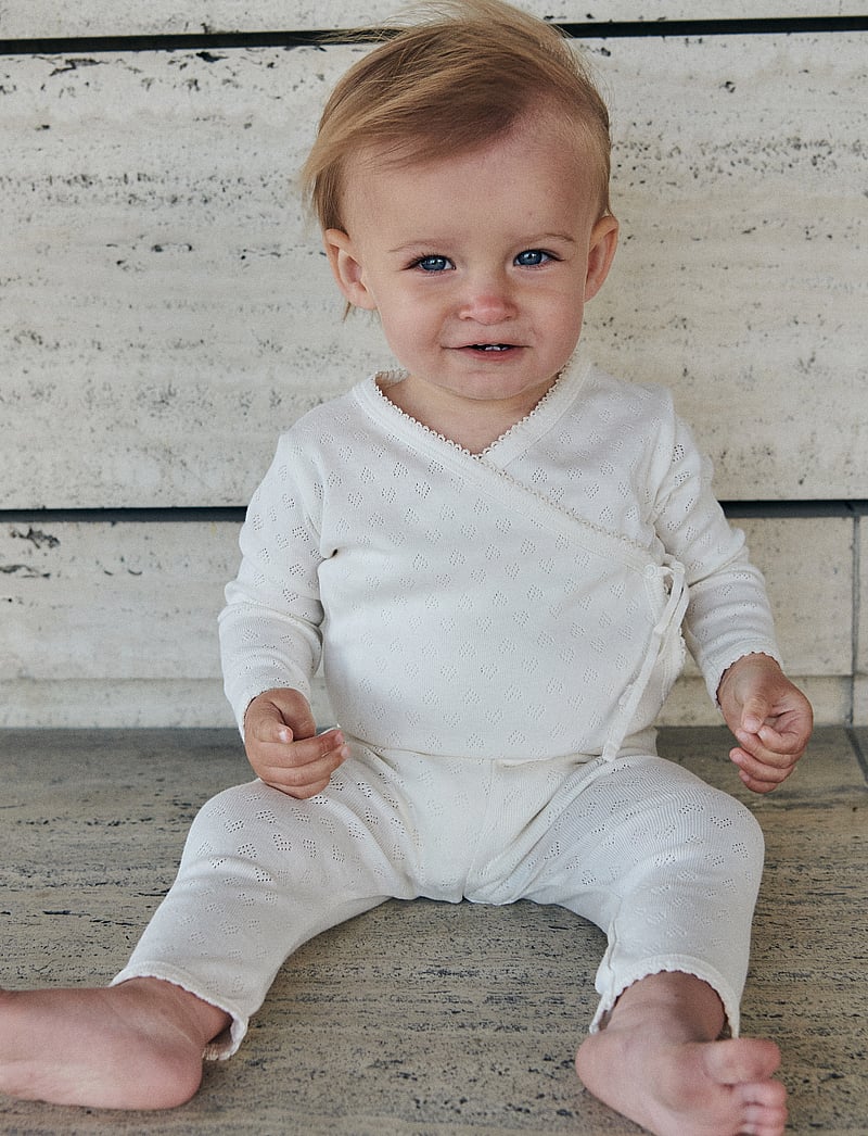 Copenhagen Colors - POINTELLE HEART CROSSOVER BODY LS - wrap bodies - cream - 0