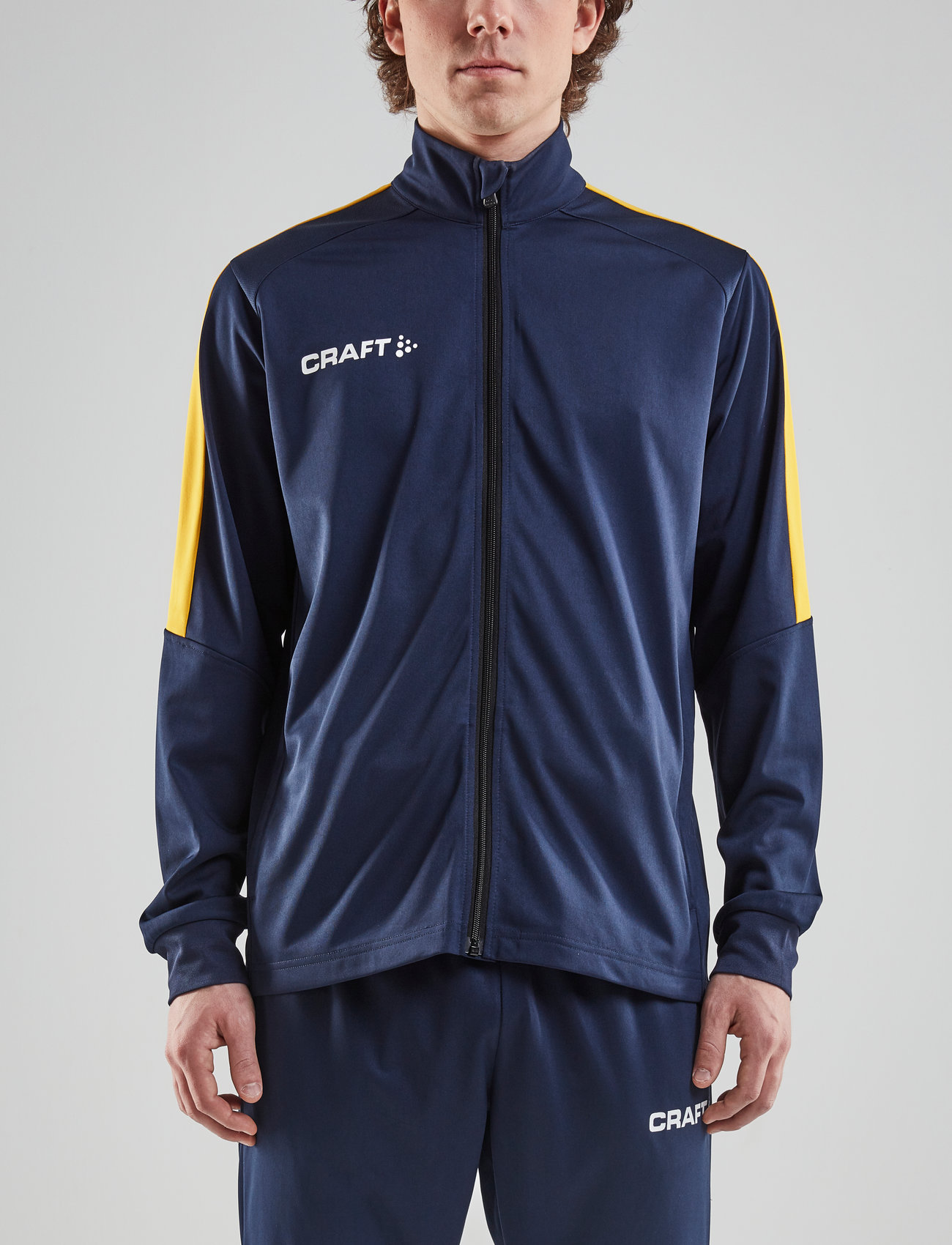 Craft - Progress Jacket M - bluzy i swetry - navy/yellow - 0