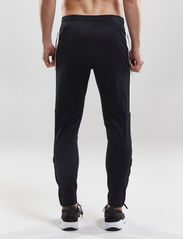 Craft - Progress Pant M - spodnie sportowe - black/white - 5