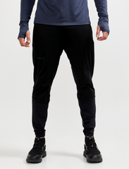 Craft - Adv Subz Wind Pants 2 M - sportbroeken - black - 2