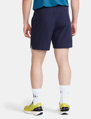 Craft - ADV Essence 6" Woven Shorts M - sportsshorts - blaze - 3