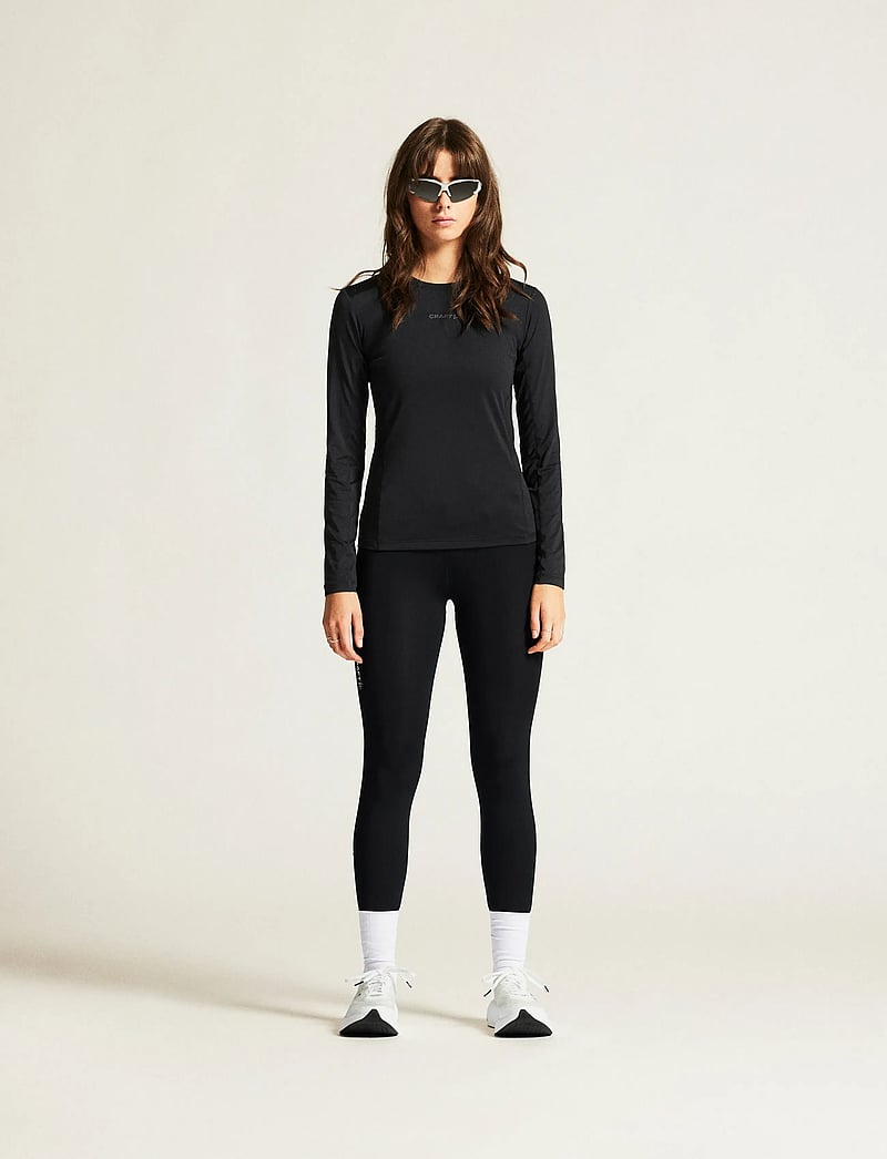 Craft - ADV ESSENCE LS TEE 2 W - langærmede t-shirts - black - 0