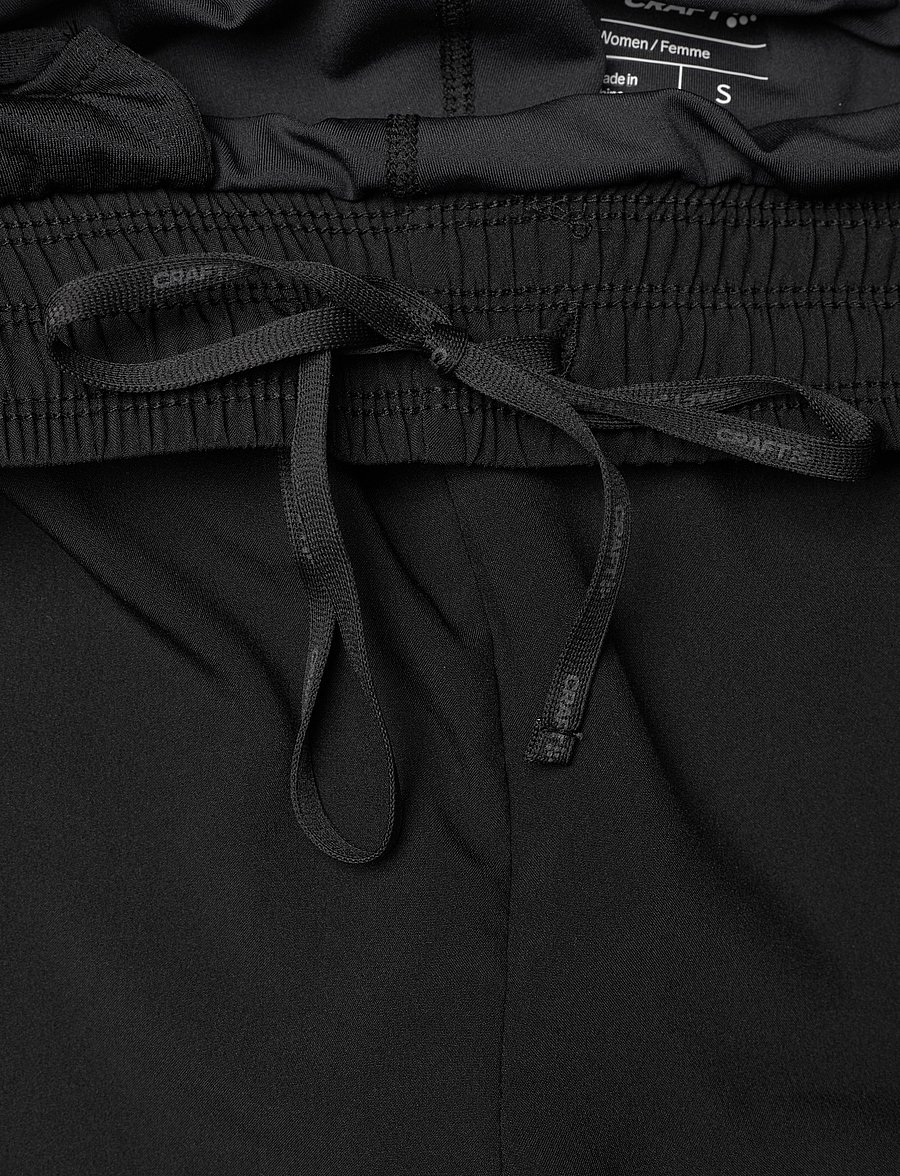 Craft - ADV ESSENCE 2-IN-1 SHORTS 2 W - lühikesed jooksupüksid - black - 2