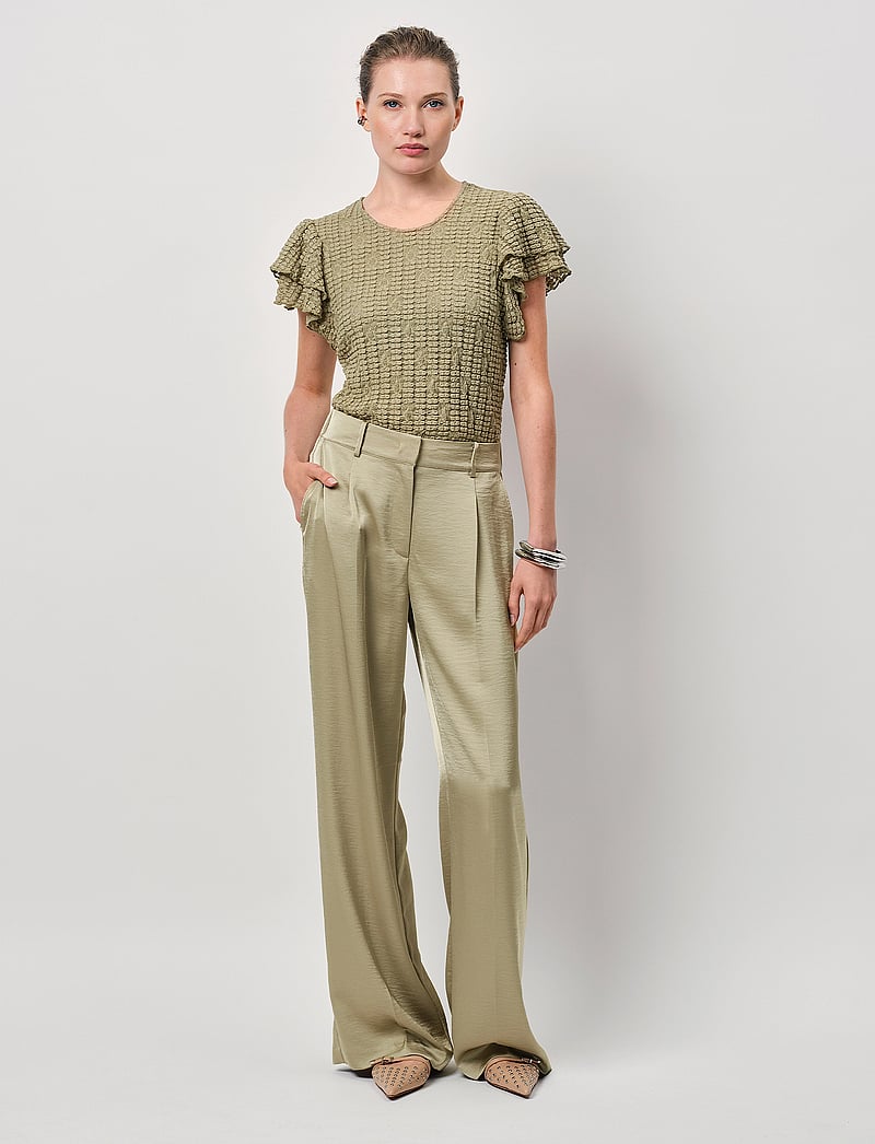 Dante6 - Dante6-Marlowé lace volant top - kurzämlige blusen - sunlit grass - 0