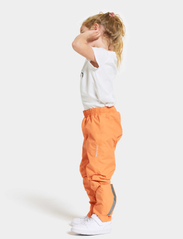 Didriksons - IDUR KIDS PANTS 4 - spodnie z powłoką shell i przeciwdeszczowe - papaya orange - 4
