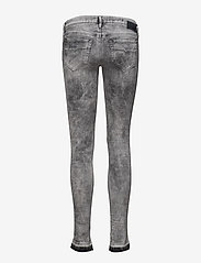 Diesel Women - SKINZEE-LOW TROUSERS - džinsa bikses ar šaurām starām - black/denim - 1