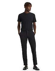 Dockers - MOTION CHINO TAPER - suit trousers - blacks - 4