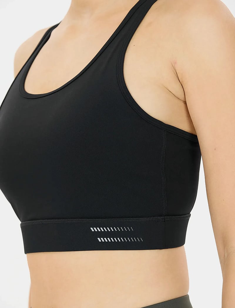 Endurance - Cynthian W Sports Bra - mittlerer halt - black - 0