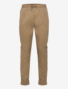 Chinos with an elasticated waistband made of blended organic, Esprit Collection