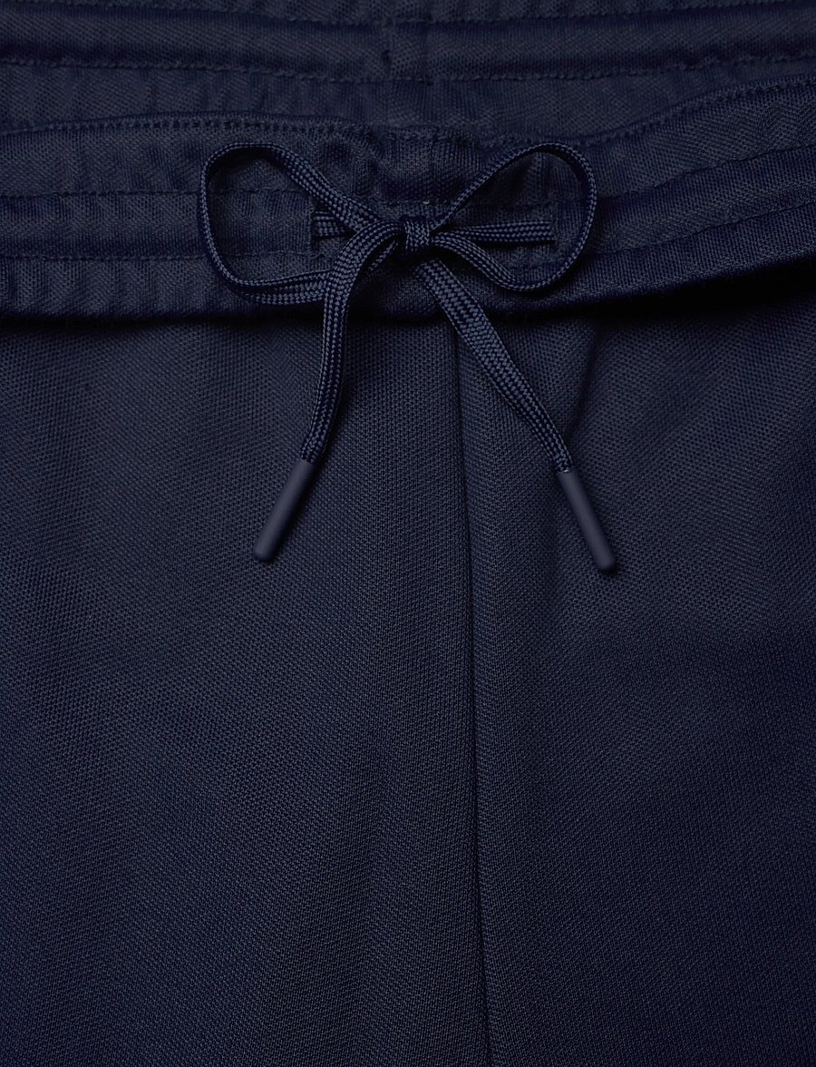 FILA - BIELLA regular taped pique track pants - hosen - black iris - 5