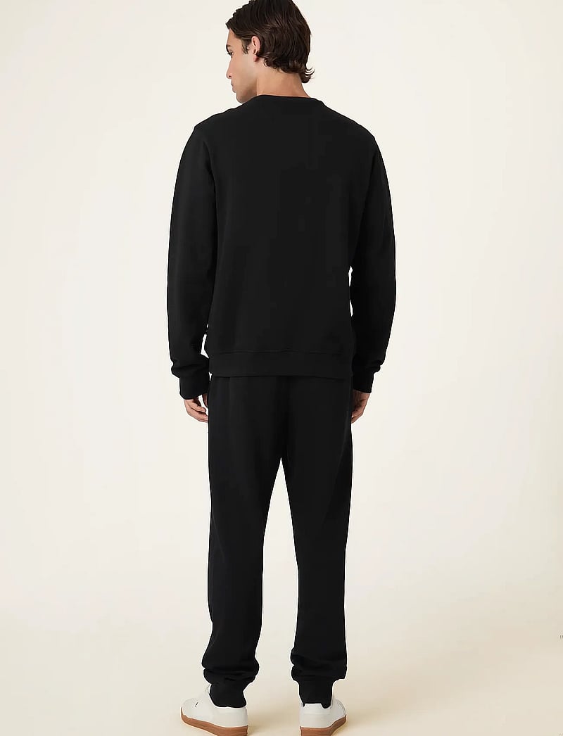 FILA - BIELLA regular sweatpants - joggingbyxor - black - 4