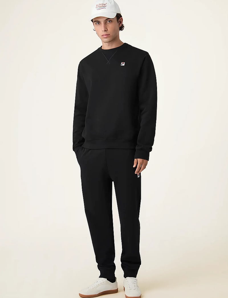 FILA - BIELLA regular sweatpants - joggingbyxor - black - 5