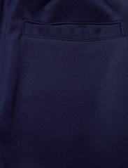 FILA - TEUCHERN trapered pique track pants - vasaras piedāvājumi - medieval blue - 4