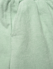 FILA - TAGMERSHEIM towelling knit track skirt - korte nederdele - silt green - 2