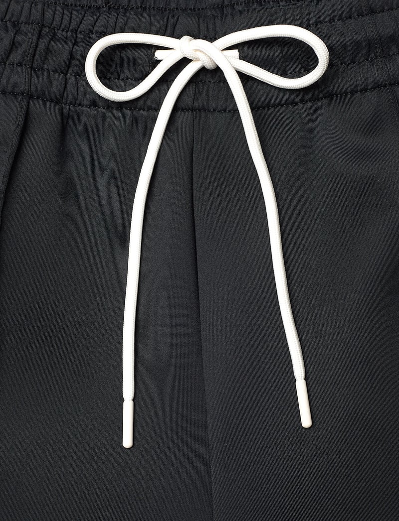 FILA - MARLIANO overlength taped track pant - joggingbukser - black - 5