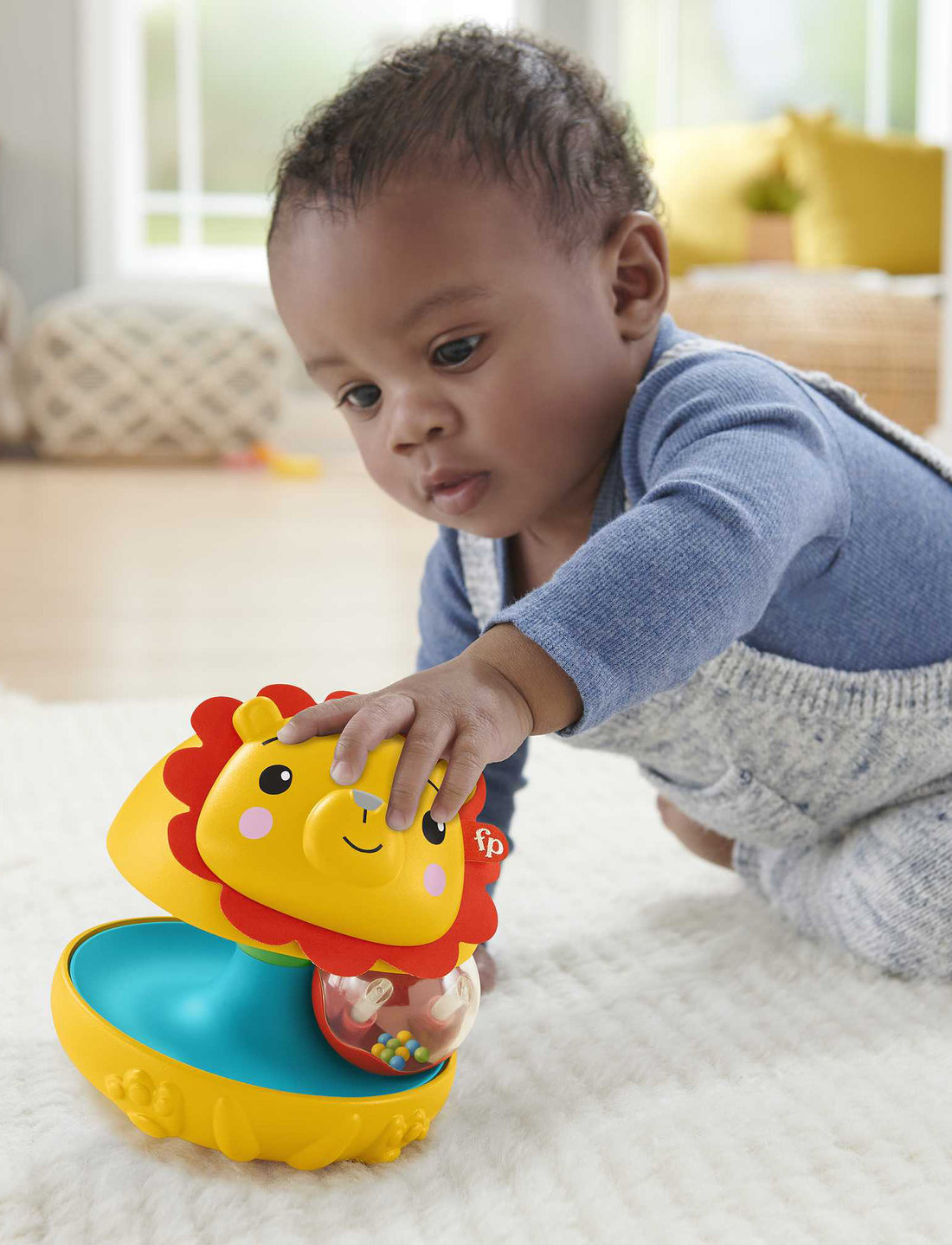 Fisher price bat and top wobble lion