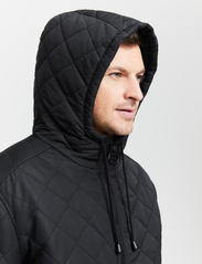 FRENN - Pekka Quilted Parka Coat - winter jackets - black - 8