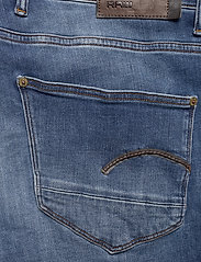 G-Star RAW - Revend Skinny - džinsa bikses ar šaurām starām - medium indigo aged - 7