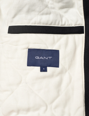 GANT - D1. OVERSIZED GANT VARSITY JACKET - spring jackets - ebony black - 6