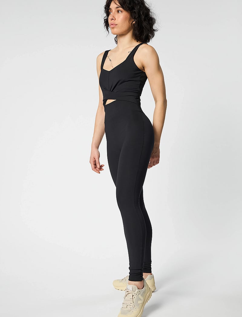 Girlfriend Collective - Twist Unitard - jumpsuits & bodies - black - 4