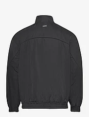 HAN Kjøbenhavn - Reversible Oversized Track Jacket - spring jackets - black - 1
