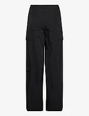 HAN Kjøbenhavn - Washed Technical Cargo Trousers - cargo pants - black - 1
