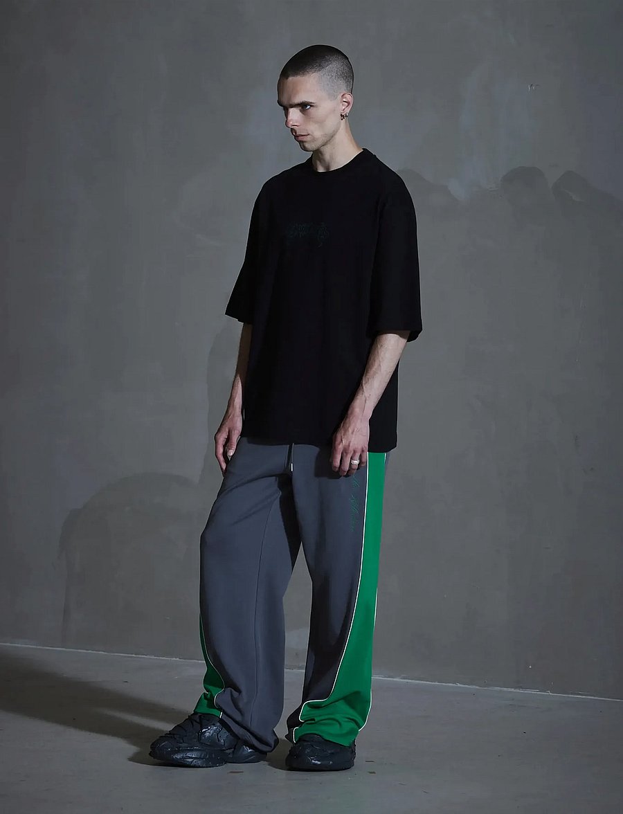 HAN Kjøbenhavn - Training Track Trousers - pantalon de sport - grey/ vibrant green - 0