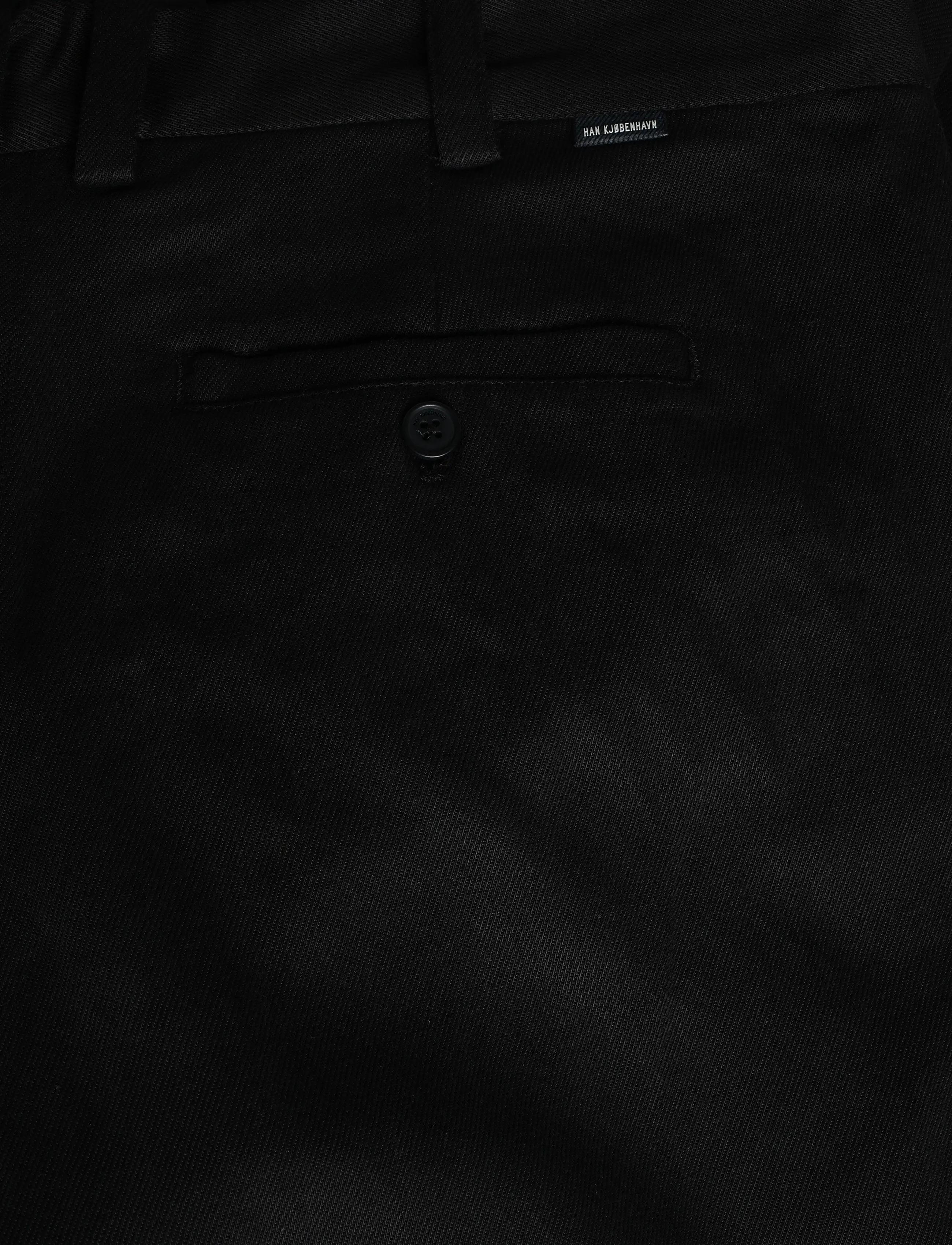 HAN Kjøbenhavn - Relaxed Tencel Trousers - vabaajapüksid - black - 5