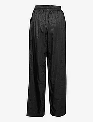 HAN Kjøbenhavn - Jacquard Wide-Leg Trousers - bikses ar platām starām - black - 1