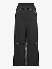 HAN Kjøbenhavn - Relaxed Track Trousers - apakšējais apģērbs - black - 1