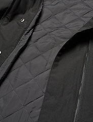 Helly Hansen - W WELSEY II TRENCH INSULATED - pavasarinės striukės - black - 9