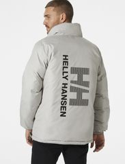 Helly Hansen - YU 23 REVERSIBLE PUFFER - padded jackets - black - 9