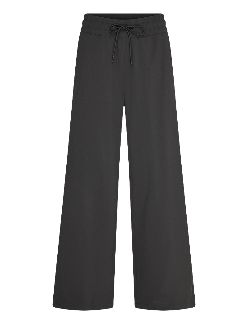 Helly Hansen - W THALIA WIDE PANT - vabaajapüksid - black - 1