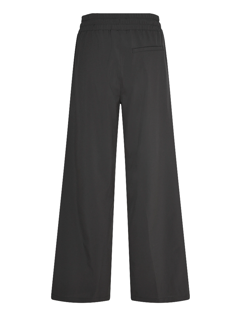 Helly Hansen - W THALIA WIDE PANT - vabaajapüksid - black - 2