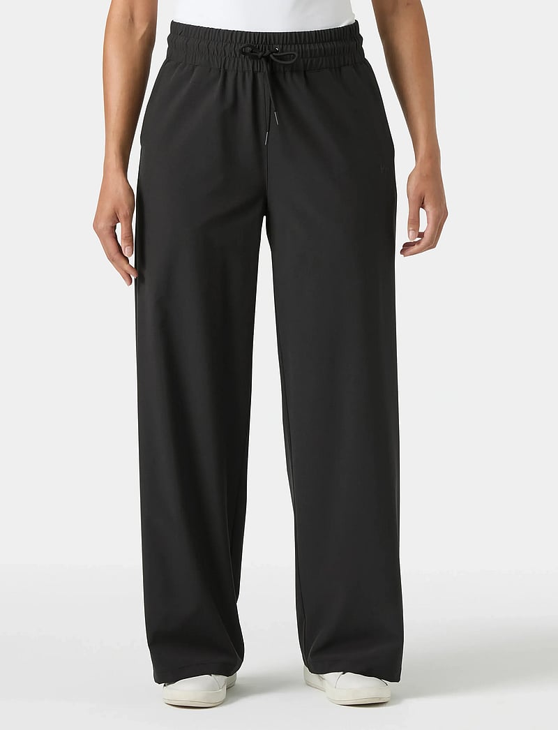 Helly Hansen - W THALIA WIDE PANT - vabaajapüksid - black - 0