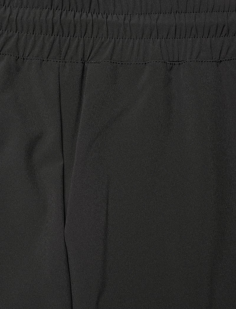 Helly Hansen - W THALIA WIDE PANT - vabaajapüksid - black - 4